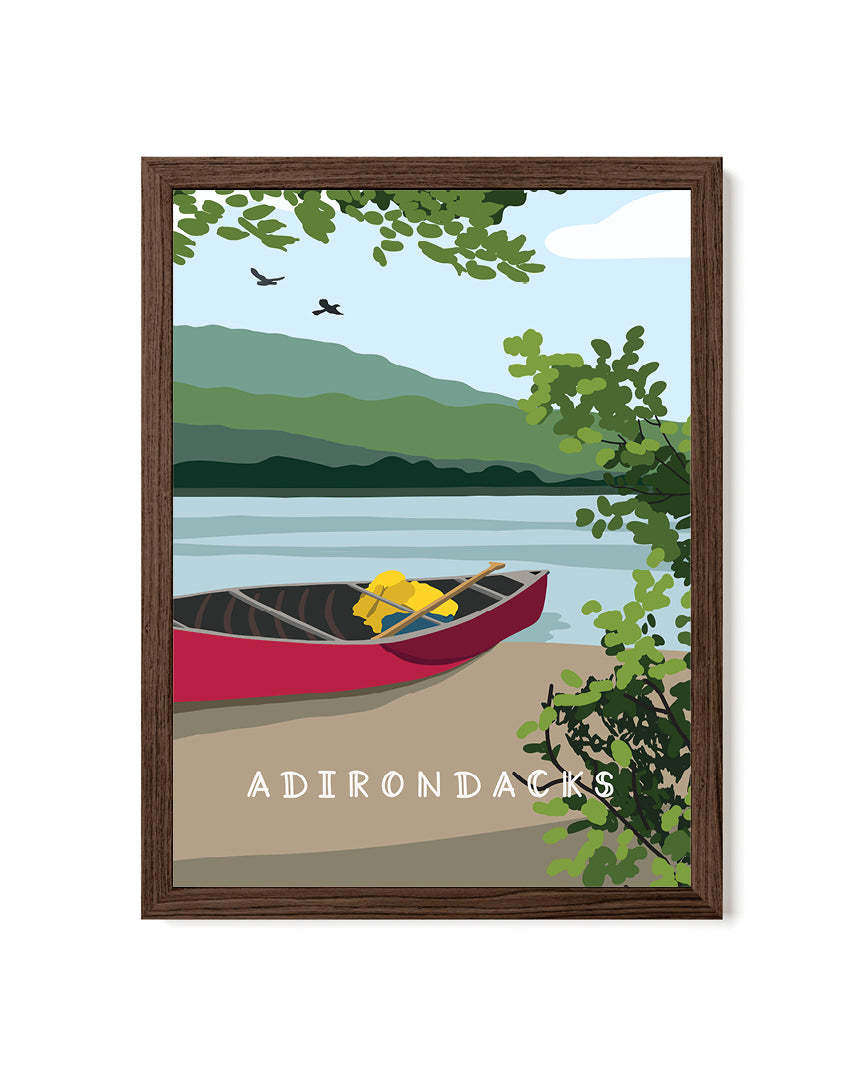 Framed artwork of a lake scene with a red canoe, trees, and mountains, labeled &