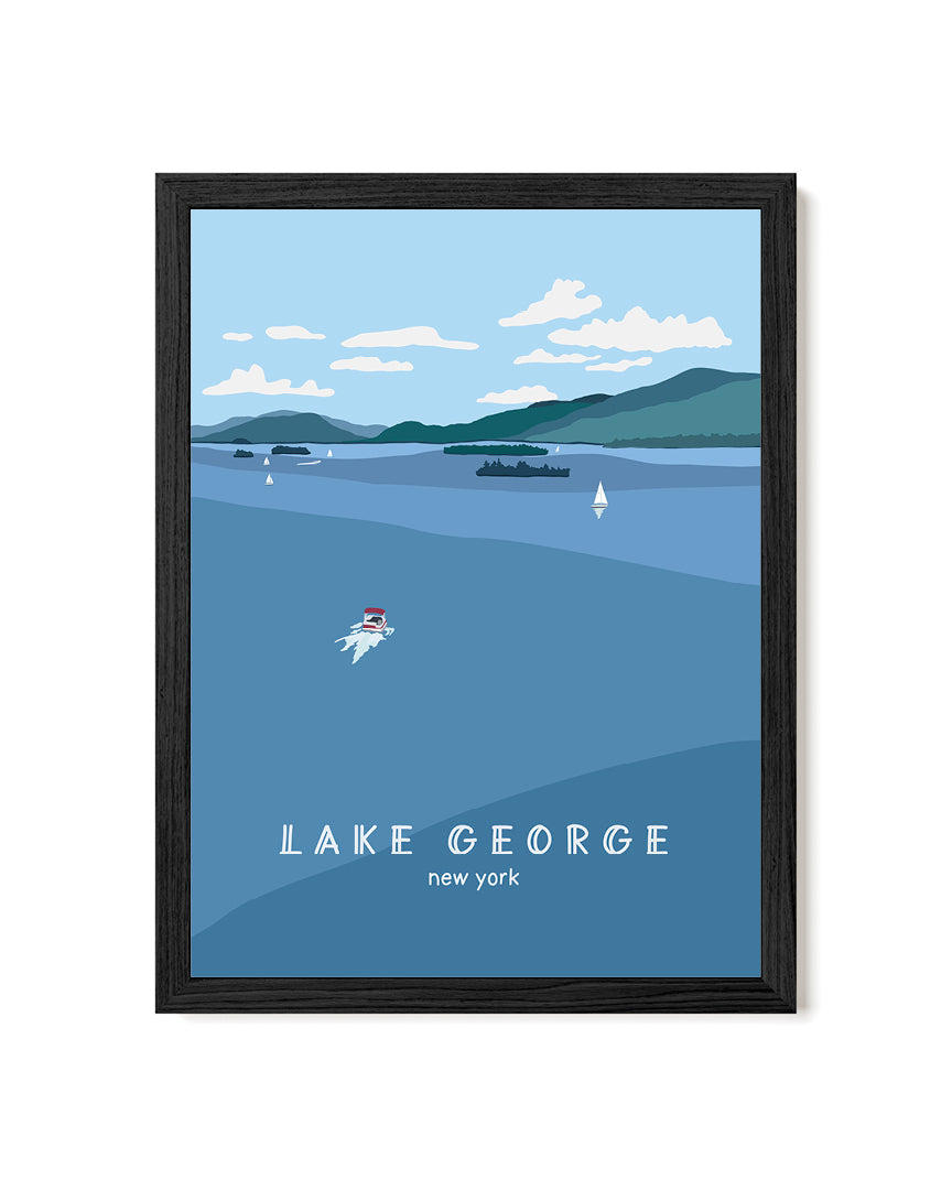 Framed artwork of Lake George, New York with boats on the water and blue sky and mountains.