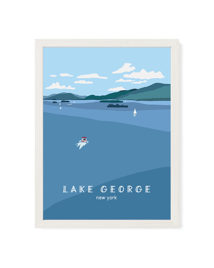 Framed artwork of Lake George, New York with boats on the water and blue sky and mountains.
