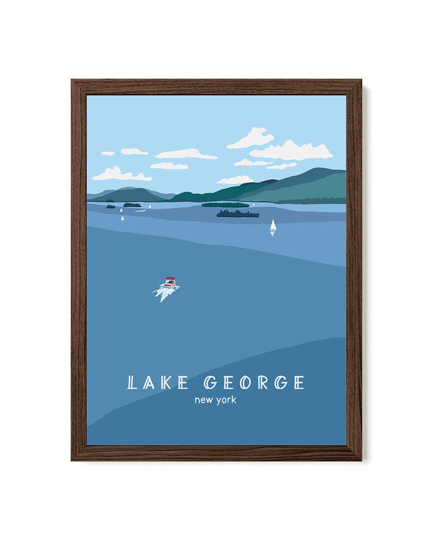 Framed artwork of Lake George, New York with boats on the water and blue sky and mountains.