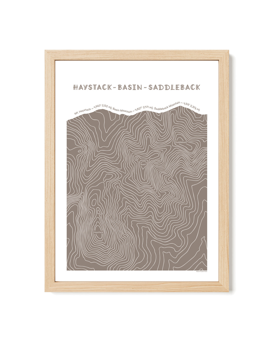 Natural framed topographic map art of Haystack, Basin and Saddleback peaks in brown line patterns on a white background