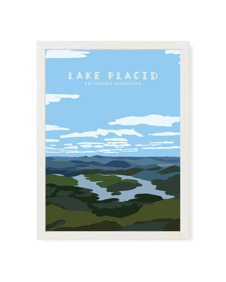 Framed artwork of Lake Placid with a mountain view and blue sky.
