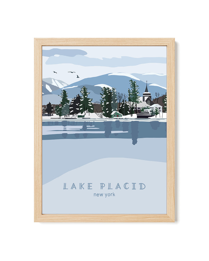 Framed artwork of a snowy landscape with trees and mountains, labeled &
