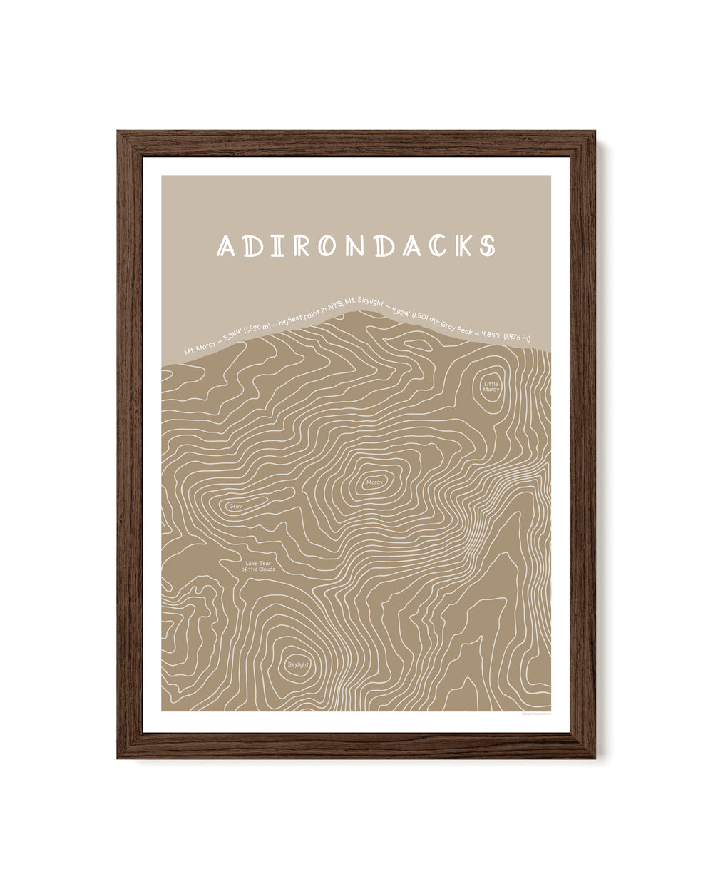 Framed topographic map print in tan of the Adirondacks with a brown frame on a white background