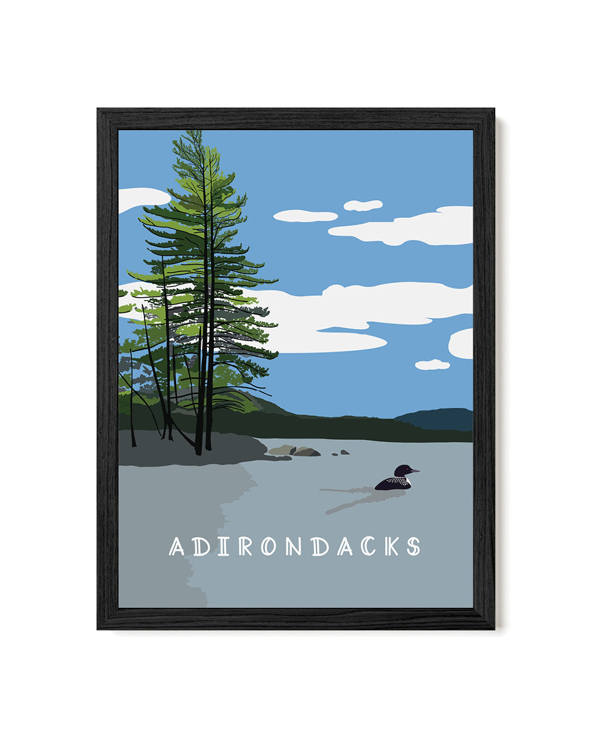 Framed artwork of a lake scene with trees and &