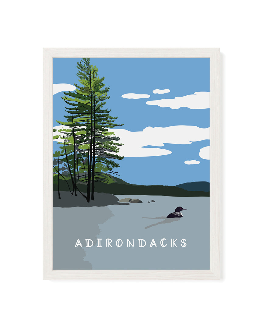 Framed artwork of a lake scene with trees and &